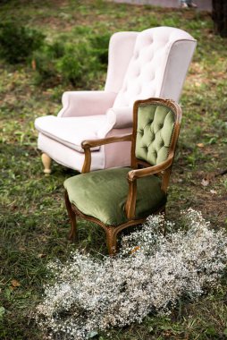 Outdoor wedding ceremony, armchairs on the grass