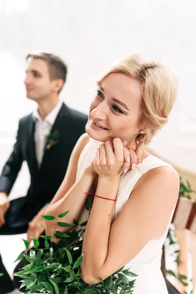 Excited guest woman at the wedding ceremony