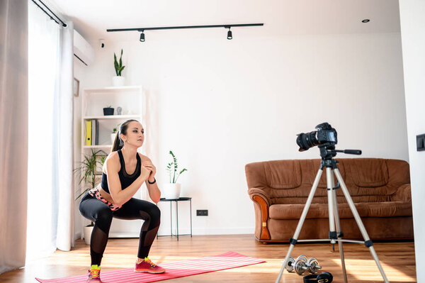 A woman is training and recording tutorial video