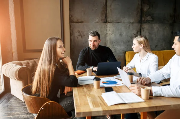 Successful young team in a loft office — Stock Photo, Image