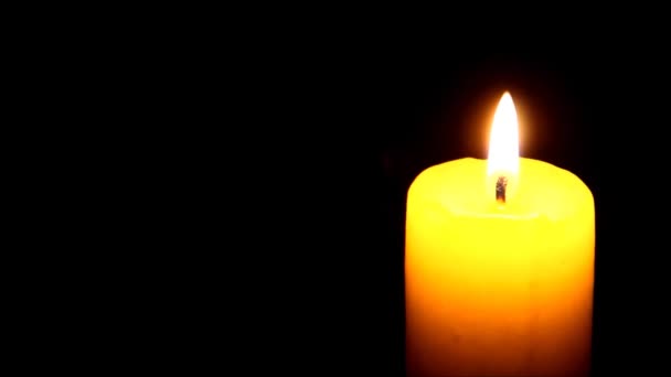 Candle being lit in the darkness — Stock Video