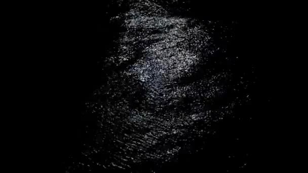 Golven van licht op het zwarte water — Stockvideo