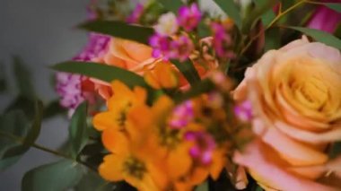 stylish bouquet of flowers made for delivery or sale of florist shop by professional creative florist, close-up