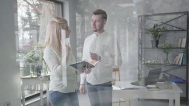 workflow, young entrepreneurs small business owners negotiate in office at meeting, team work