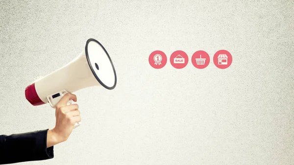 Hand with a megaphone — Stock Photo, Image