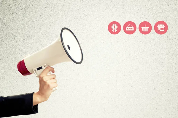 Hand with a megaphone — Stock Photo, Image