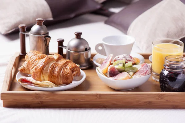 breakfast tray in an hotel room