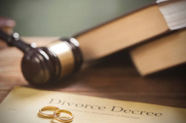 Close-up Of Wedding Rings on wood table with american flag — Stok Foto