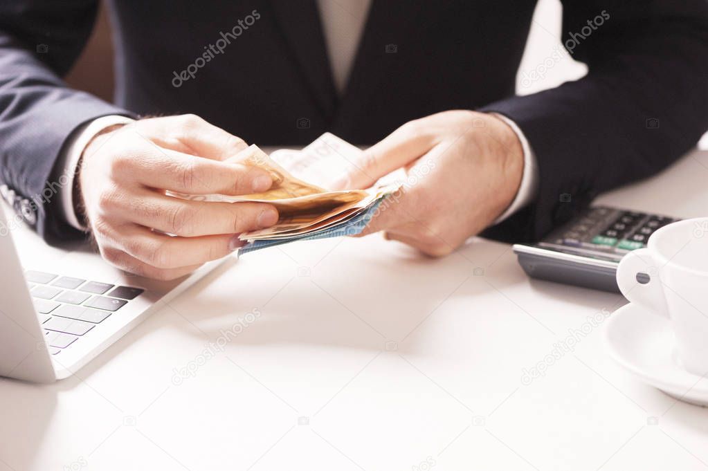 man holding money