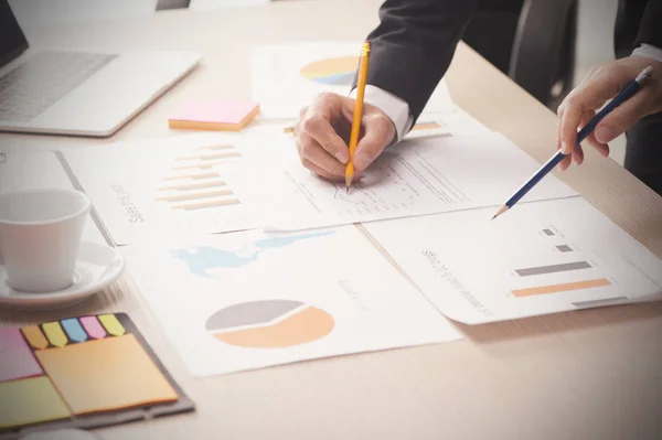 Business people during paperwork at meeting