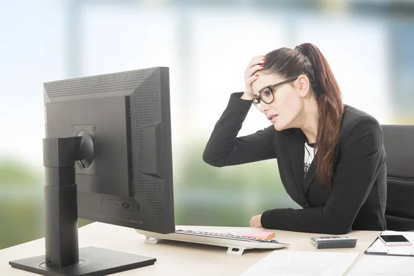 Young professional woman stressed and tired with headache — Stock Photo, Image