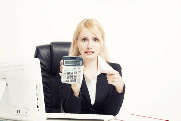 Businesswoman showing calculator — Stock Photo, Image