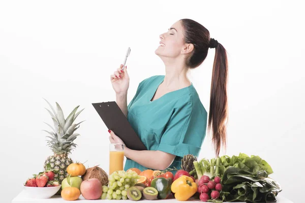 Doctor dietitian recommending healthy food — Stock Photo, Image