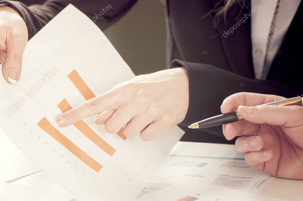 Business people during paperwork at meeting