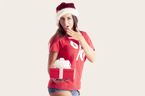 Jovem santa menina com chapéu de Natal — Fotografia de Stock