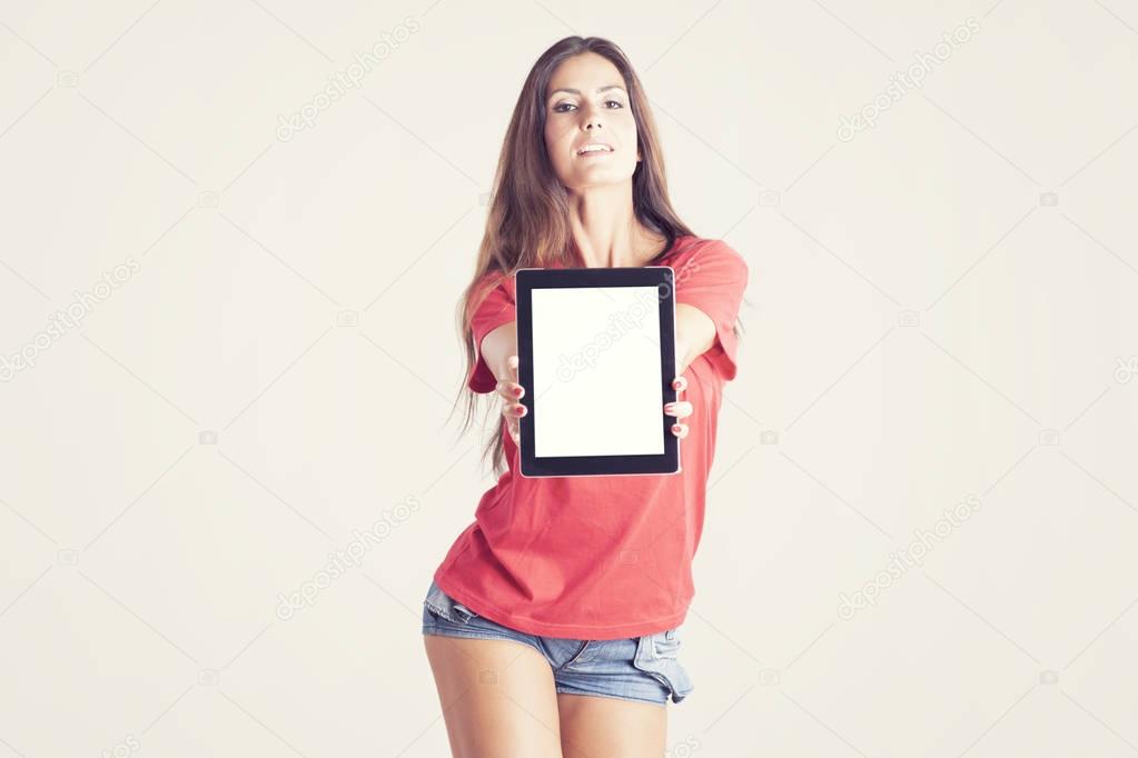 Woman holding a tablet with empty black screen