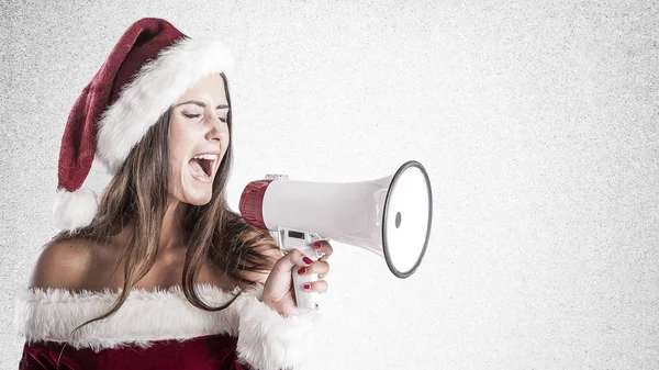 Mulher de Natal gritando por megafone — Fotografia de Stock