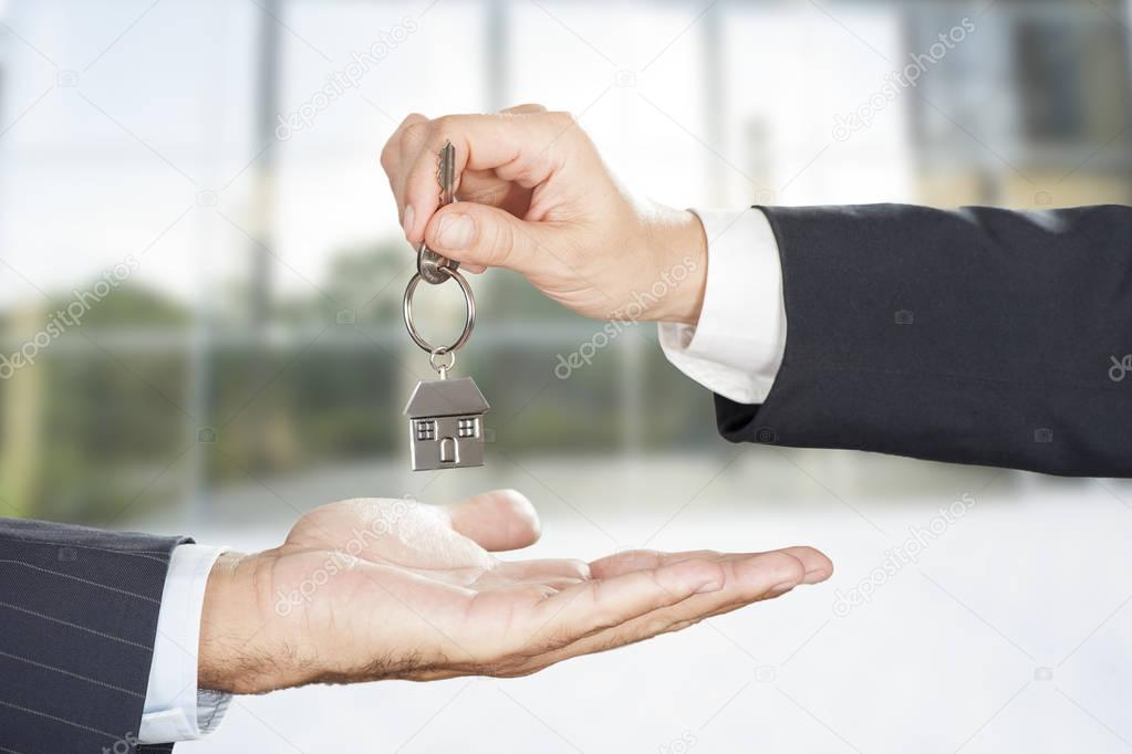 Handing Over the Key from a New Home