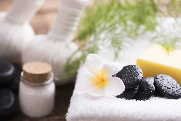 Spa stones with towel and plumeria — Stock Photo, Image