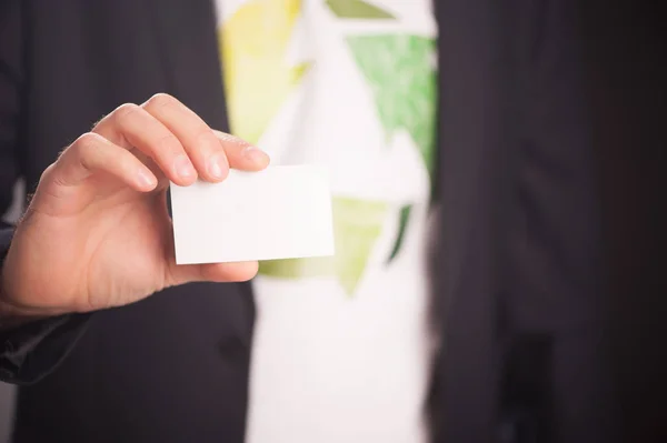 Reduce Reuse Recycle. Businessman Holding A White Card With Text