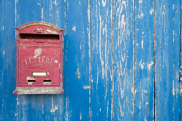 Letter Box On Blue Wood Door