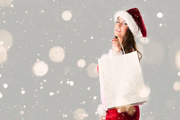 Weihnachtsmann mit Einkaufstüten — Stockfoto