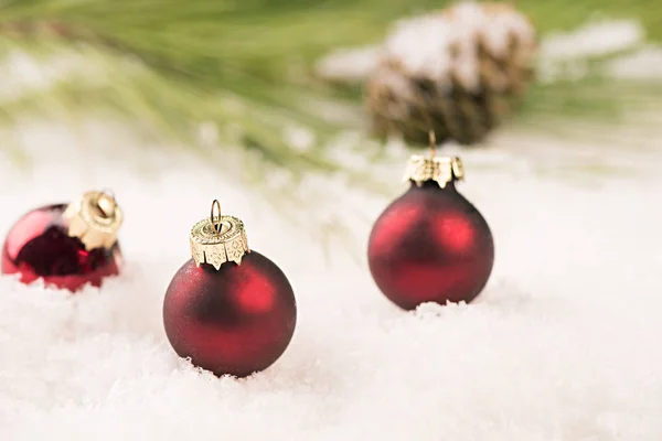 Baubles in the snow. Christmas greeting — Stock Photo, Image