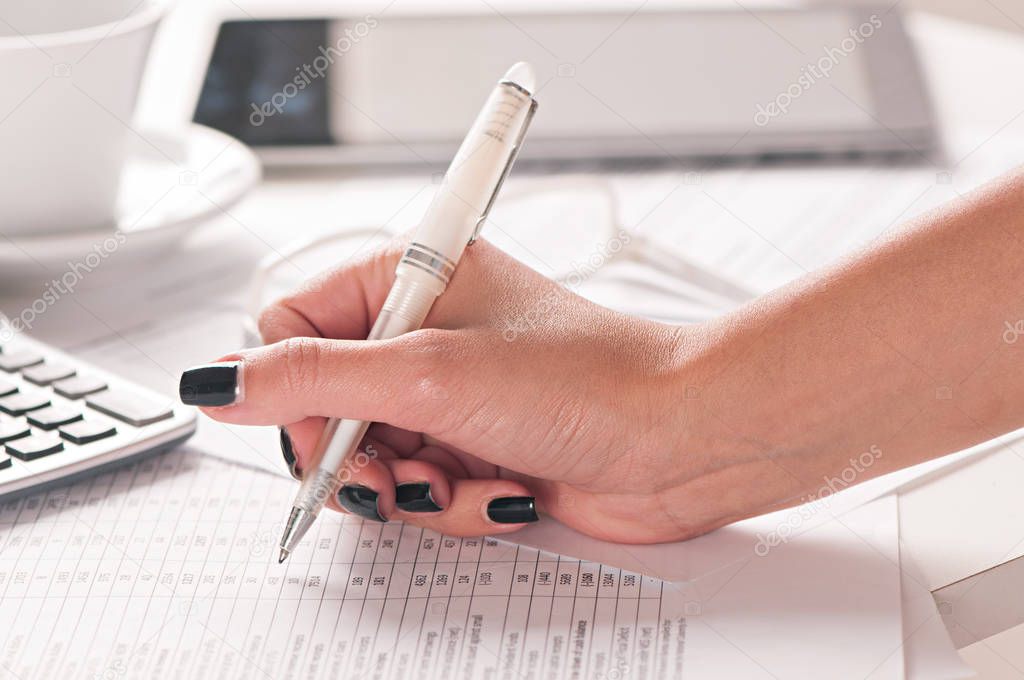Close up hand woman making accounting