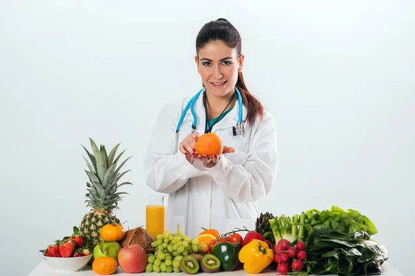 Female dietitian in uniform with stethoscope — Stock Photo, Image