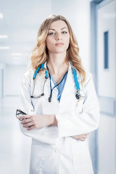 Female Doctor White Surgical Coat Stethoscope Blue Paper Holder Hands — Stock Photo, Image