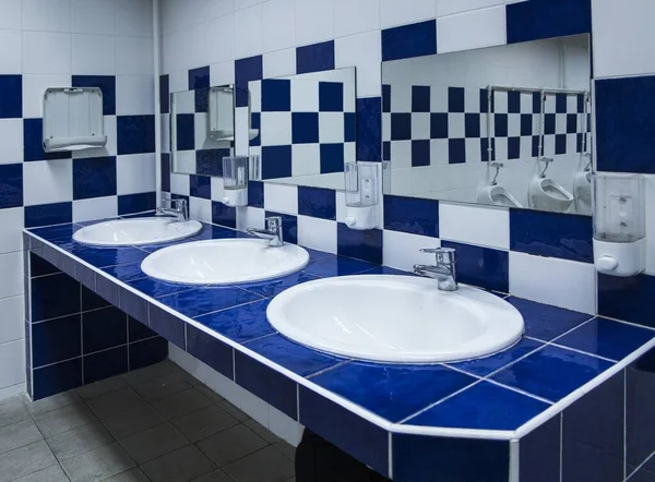 stock image Modern Public Bathroom with blue white tiles