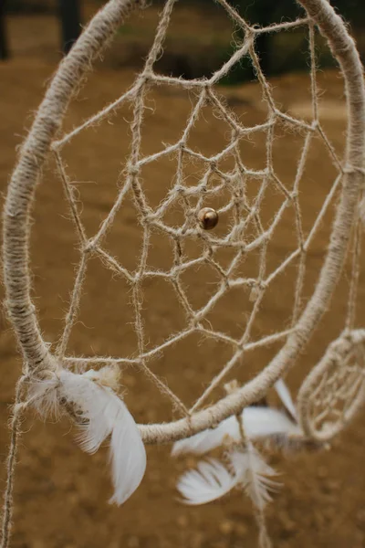 Dream catcher hanging  in a dry land — Stock Photo, Image