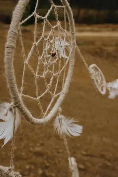 Dream catcher hanging  in a dry land — Stock Photo, Image