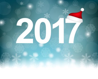 Kar taneleri ile mavi bir arka plan üzerinde yeni yıl 2017