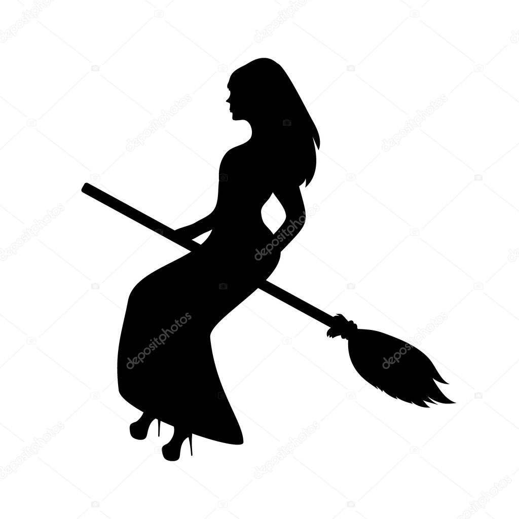 silhouette of a witch on a broomstick on Halloween