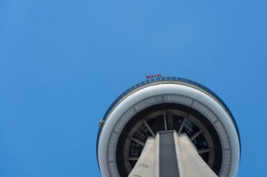 Tourists on top of CN Tower in Toronto clipart