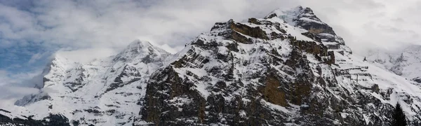 Three most famous summits of Bernese Alps in Switzerland covered — Stock Photo, Image