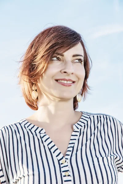 Portrait of young caucasian woman in sunny outdoor, retro photo — Stock Photo, Image