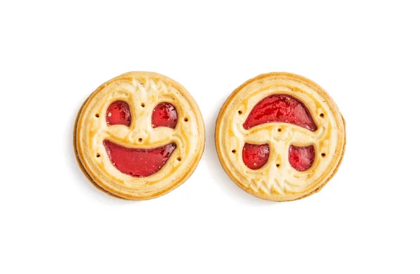 Zwei runde Kekse lächelnde Gesichter, humorvolles süßes Essen, isoliert — Stockfoto