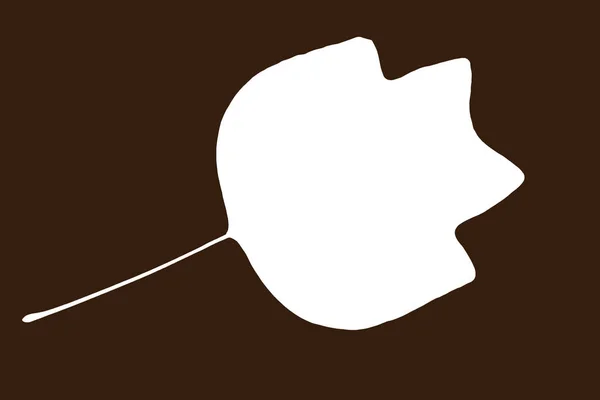 Белая форма листа на коричневом фоне — стоковое фото