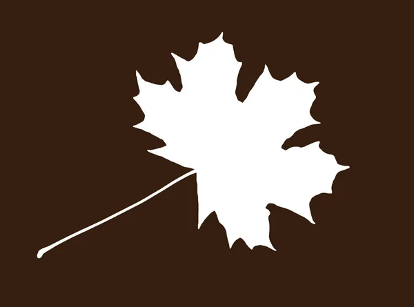 茶色の背景にカエデの葉の白い図形 — ストック写真