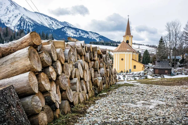 Church of Virgin Mary Visitation and wooden beams in Zdiar, Slov — Stock Photo, Image