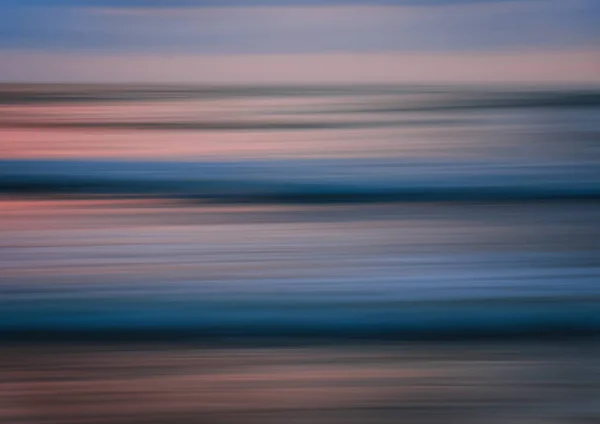 Abstrait mouvement flou coucher de soleil nature fond sur la mer — Photo