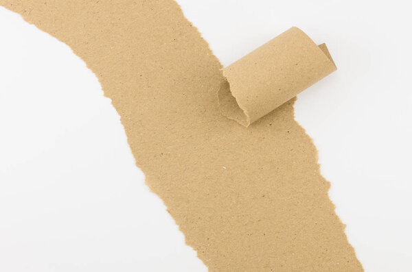 Blank brown paper roll on white background.