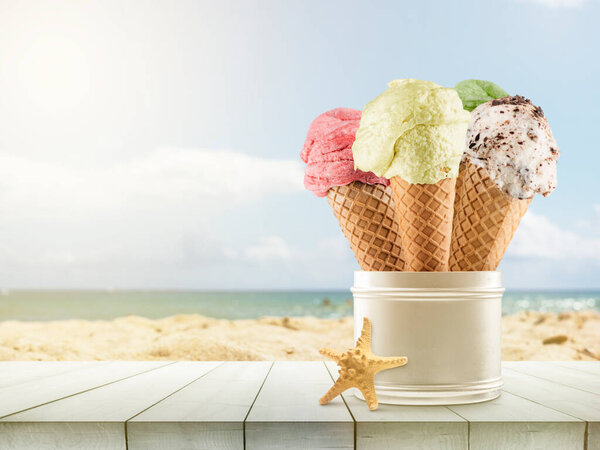 Summertime. Ice cream cones with different flavors on the beach.