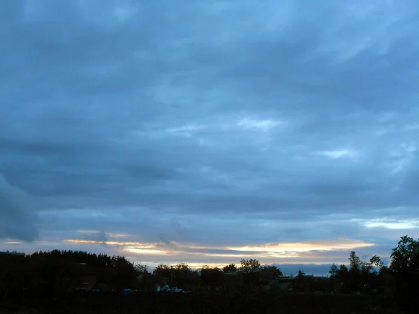 Evening sky under village landscape — Stock Photo, Image