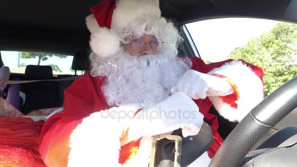 Santa Claus dancing happy while driving car super slow motion 4K — Stock Video