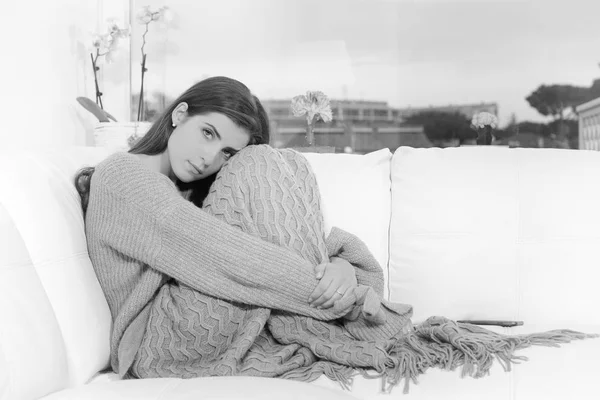 Sad lonely woman at home in winter pensive heart broken black and white — Stock Photo, Image