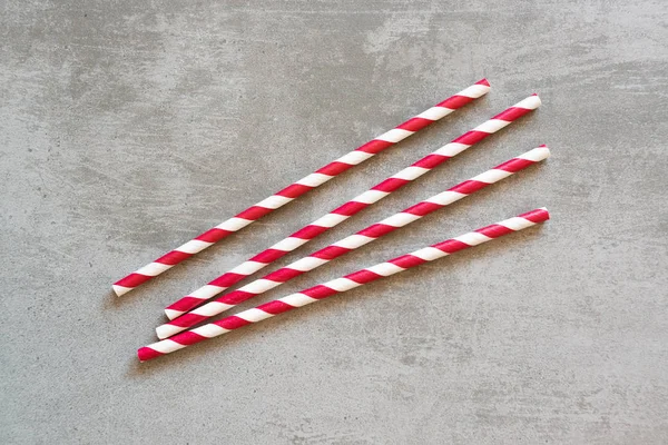 Red and white striped drinking straws — Stock Photo, Image