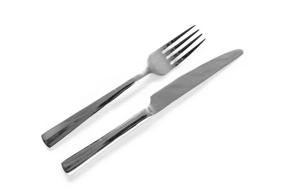 Tenedor y cuchillo sobre fondo blanco —  Fotos de Stock